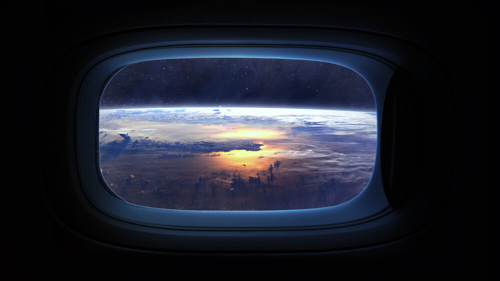 Espacio vista desde la ventana de una nave